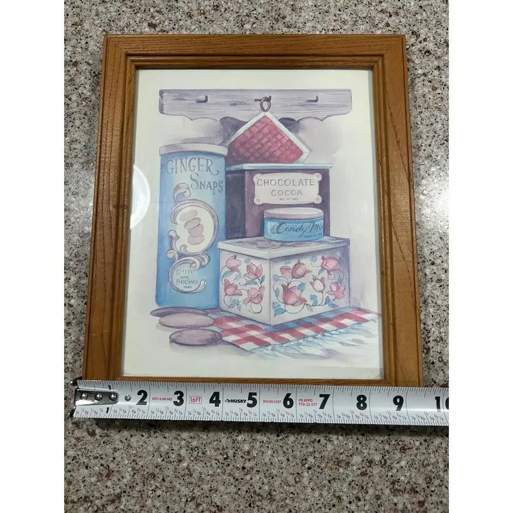 Framed art print,still life of kitchen canisters on a shelf